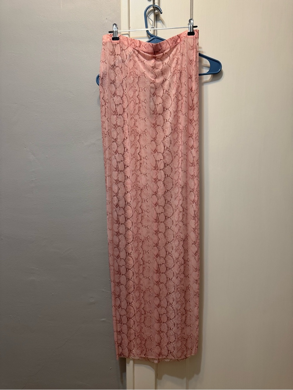 Skims milky sheer pastel rose snake print.